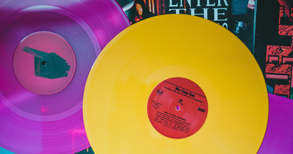 Yellow and purple 12 inch records side by side